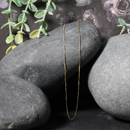 Cadena clásica de oro amarillo de 14k y 0.6mm