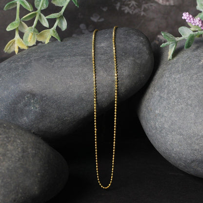Cadena de oro amarillo de 14k de 1.0mm con cuentas facetadas