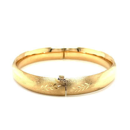 Pulsera de oro amarillo de 14k con diseño floral clásico (10,0 mm)