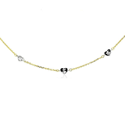 Tobillera de oro de 14k de dos tonos con estaciones de corazón de estilo tallado con diamante