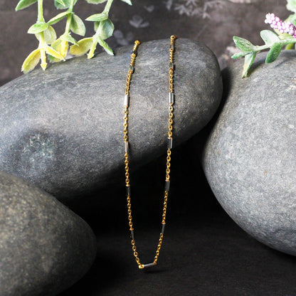 Cadena con eslabones de barra en oro bicolor de 14k (1.4mm)