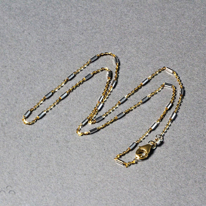 Cadena con eslabones de barra en oro bicolor de 14k (1.4mm)