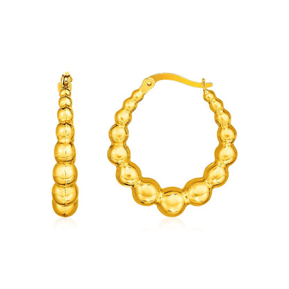 Pendientes de aro de oro amarillo de 14k con esferas graduadas