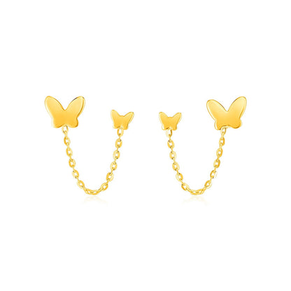 Pendientes de poste de oro amarillo de 14k con dos orificios y mariposas