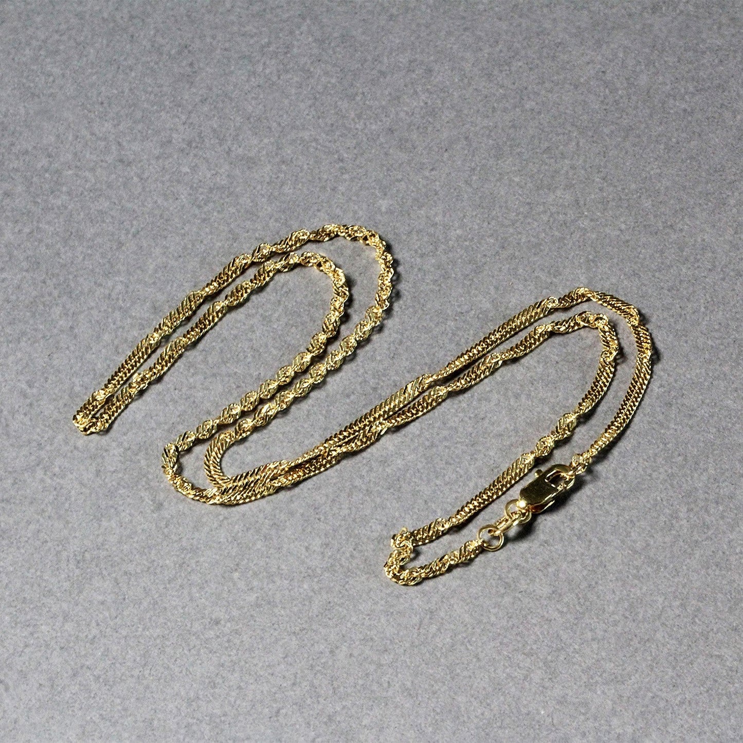 Cadena Singapur de oro amarillo de 14k y 1,7 mm
