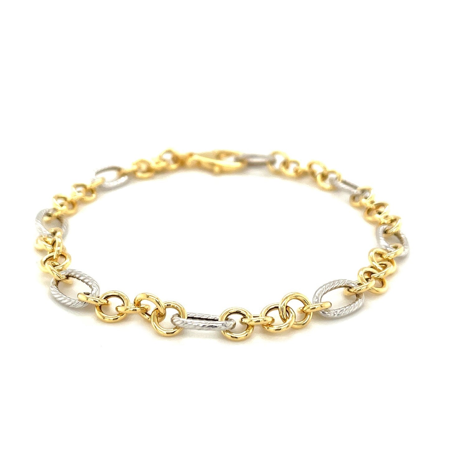 Brazalete con cadena de eslabones ovalados y redondos con motivo de cuerda en oro bicolor de 14k