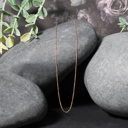Cadena de eslabones tipo cable con corte de diamante en oro rosa de 14k y 0.7mm