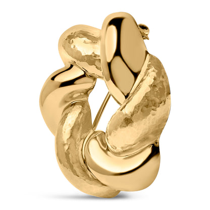 Broche de nudo esculpido en oro amarillo de 18K