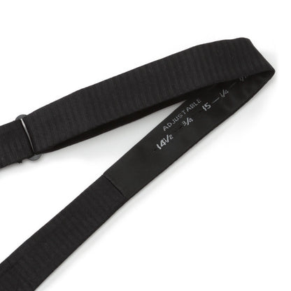 Corbata de moño de seda formal negra a rayas diplomáticas