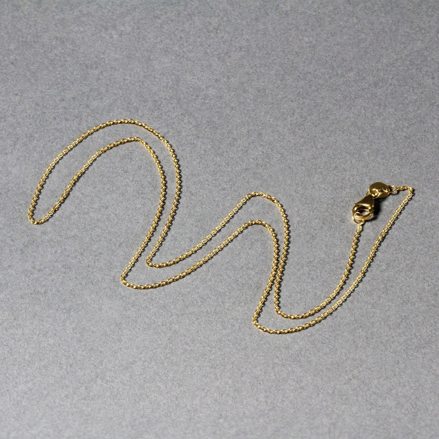 Cadena de eslabones ovalados de oro amarillo de 10k (0,97 mm)