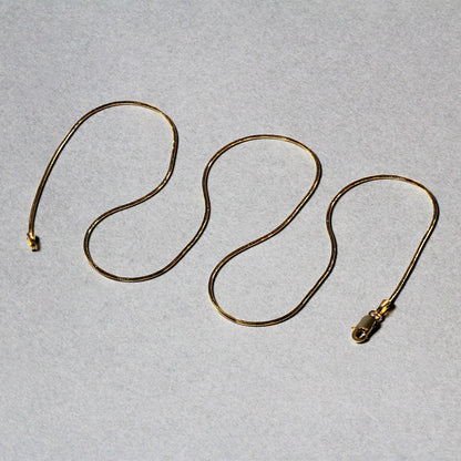 Cadena redonda de oro amarillo de 14 quilates tipo serpiente de 0,9 mm