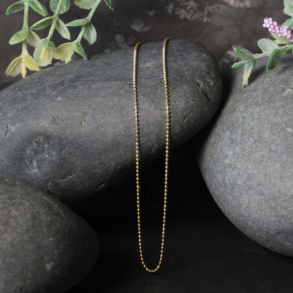 Cadena de oro amarillo de 14k de 1.0mm con cuentas facetadas