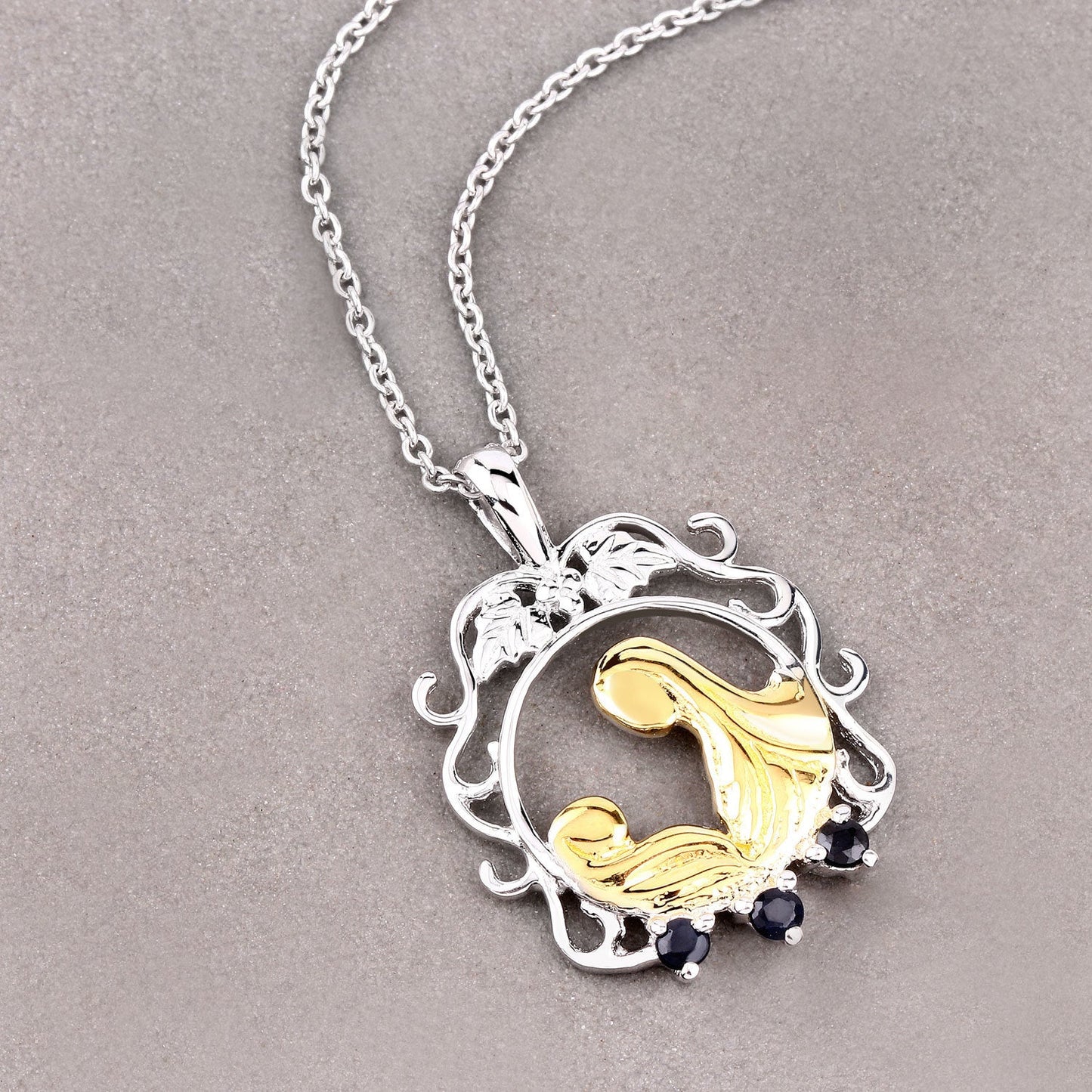 Colgante de plata de ley .925 con zafiro azul auténtico de 0,12 quilates