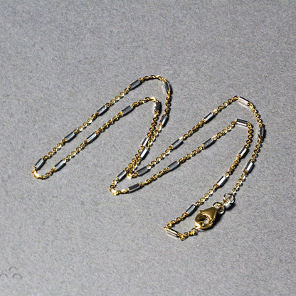 Cadena con eslabones de barra en oro bicolor de 14k (1.4mm)