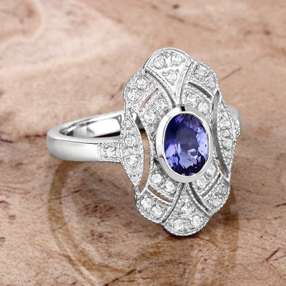 Anillo de plata esterlina .925 con tanzanita genuina de 1,17 quilates y topacio blanco