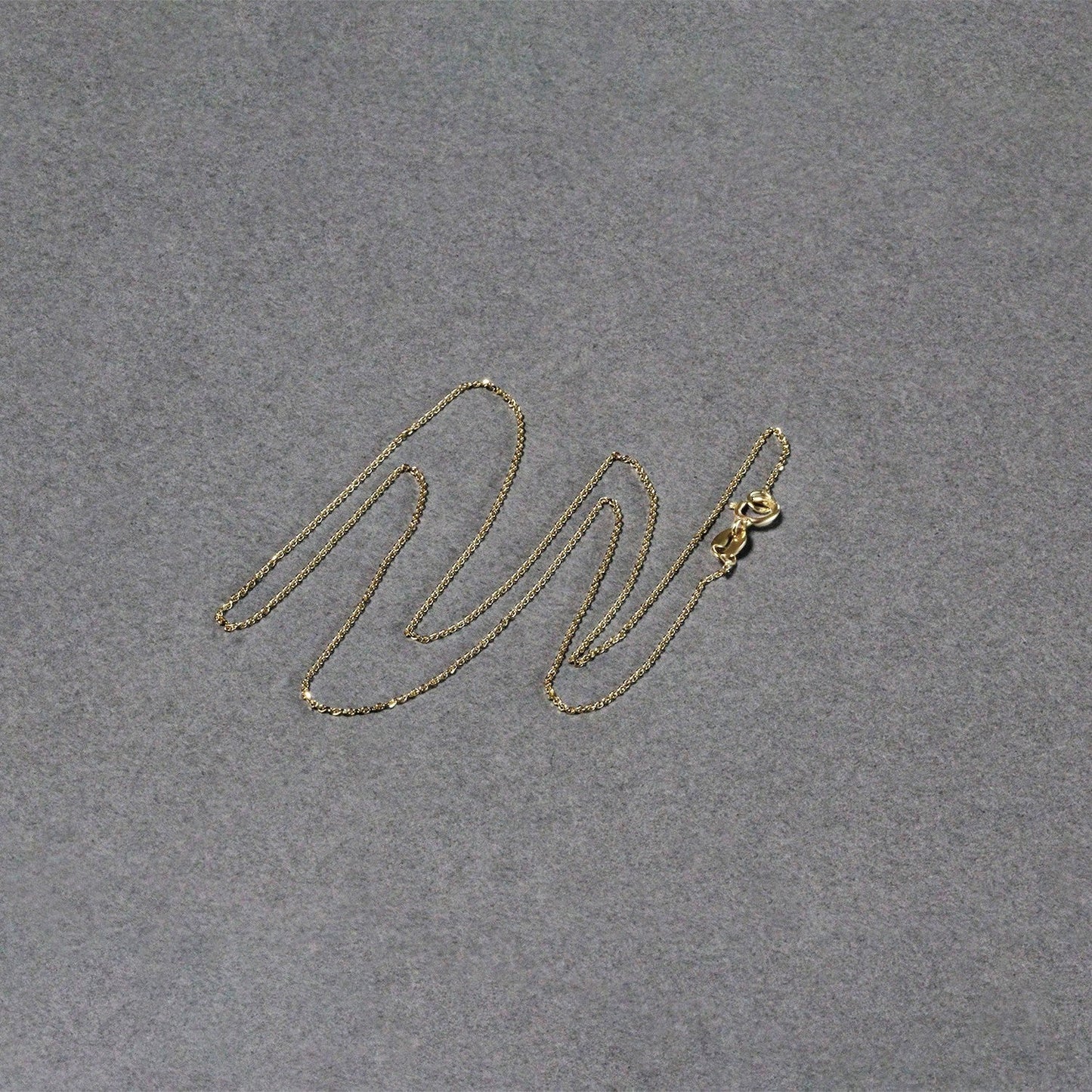 Cadena de eslabones tipo cable con corte de diamante de oro amarillo de 14k y 0,7 mm