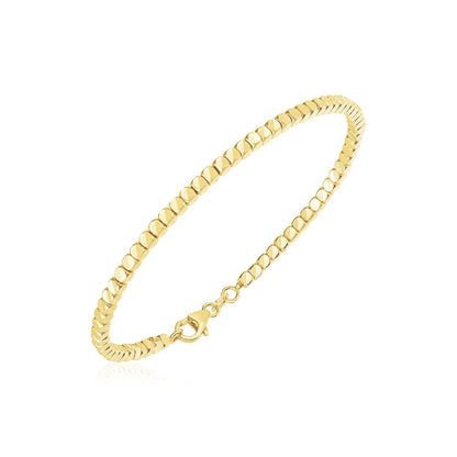 Brazalete de oro amarillo de 14 quilates con cuentas de alto pulido