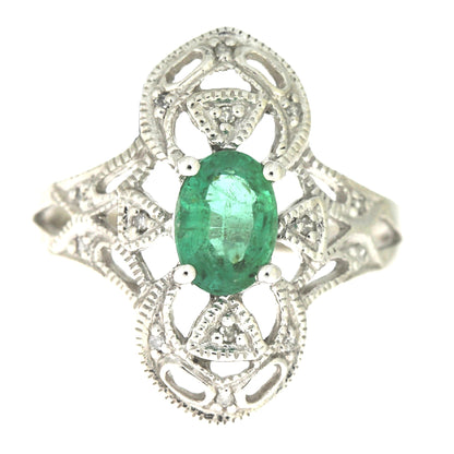 Anillo de oro blanco de 10 qt con diamante y esmeralda de 0,70 ct