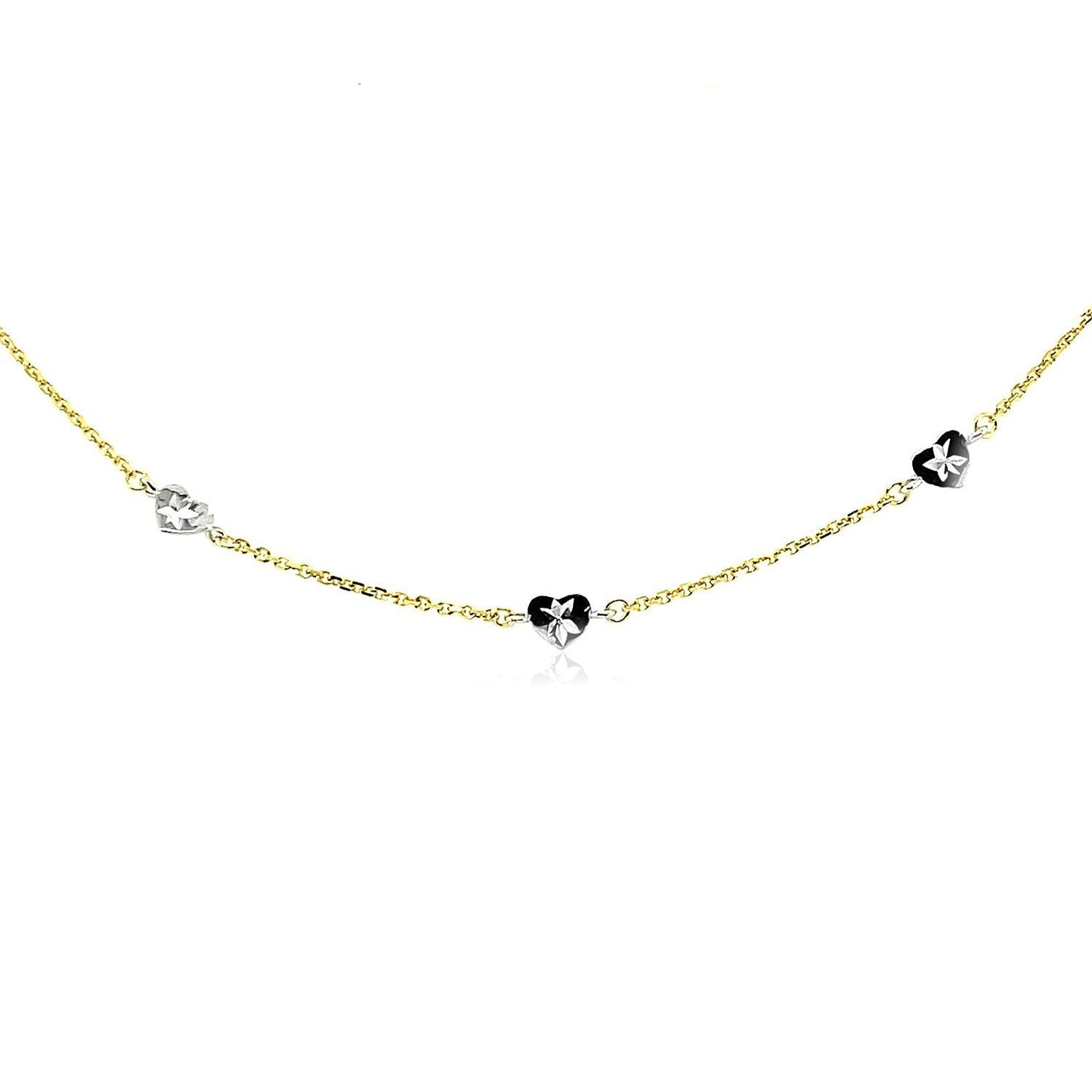 Tobillera de oro de 14k de dos tonos con estaciones de corazón de estilo tallado con diamante