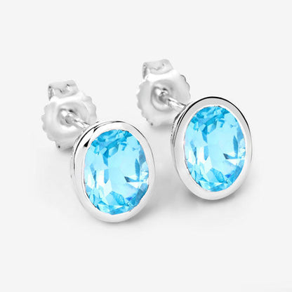 Pendientes de plata de ley .925 con topacio azul suizo auténtico de 4,00 quilates
