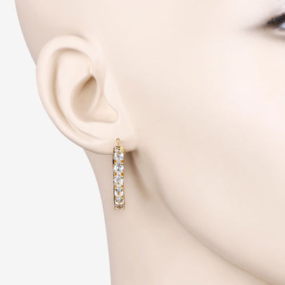 Pendientes de plata de ley .925 con topacio azul genuino de 3.80 quilates