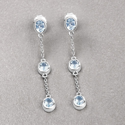 Pendientes de plata de ley .925 con topacio azul auténtico de 2,16 quilates