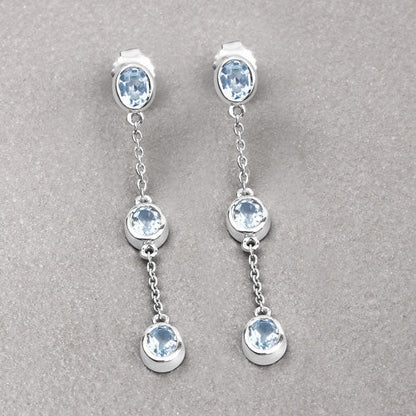 Pendientes de plata de ley .925 con topacio azul auténtico de 2,16 quilates