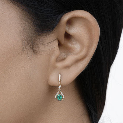 Pendientes de oro amarillo de 14 quilates con esmeralda zambiana auténtica de 0,70 quilates y diamantes blancos