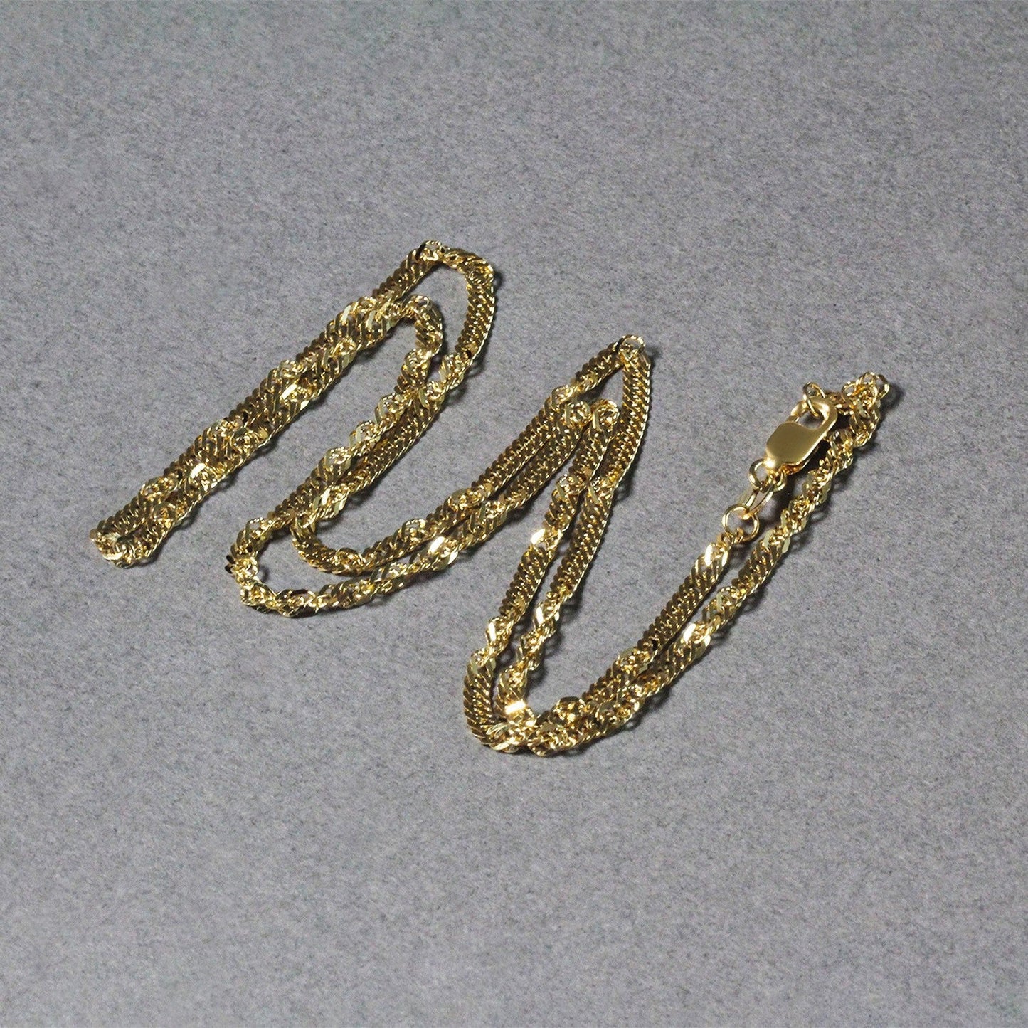 Cadena Singapur de oro amarillo de 14k y 2.1mm