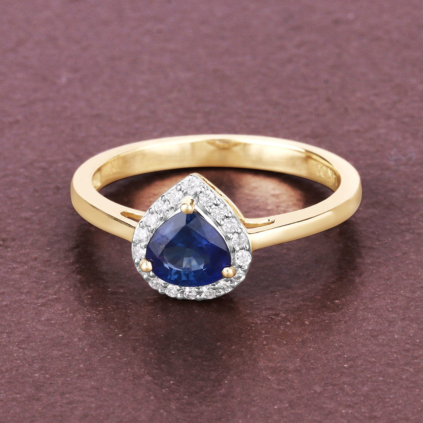 Anillo de oro amarillo de 14 quilates con zafiro azul auténtico de 0,73 quilates y diamante blanco