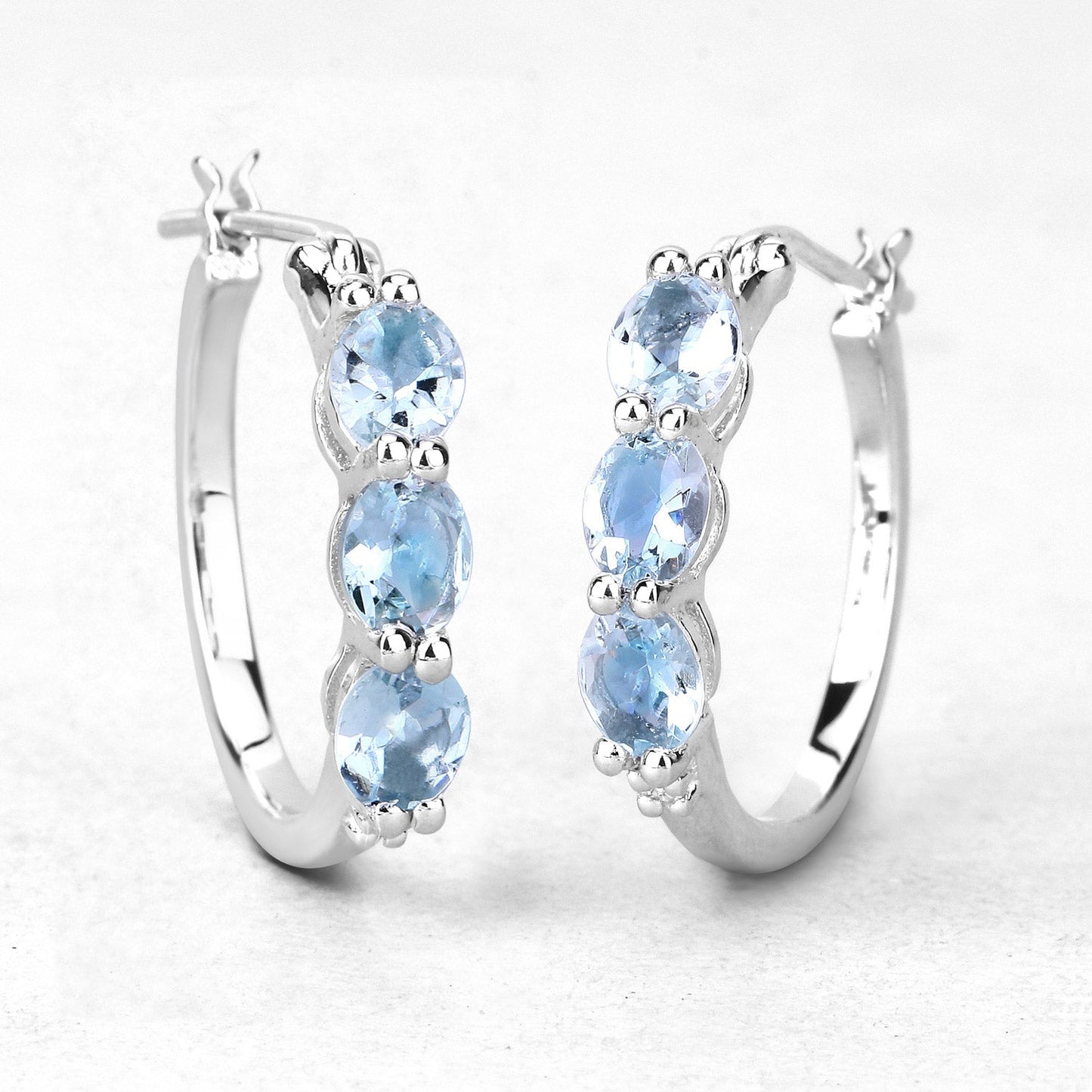 Pendientes de plata de ley .925 con aguamarina auténtica de 1.75 quilates y diamantes blancos