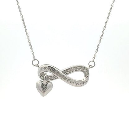 Colgante religioso de cruz con diamante de .04ct de plata de ley
