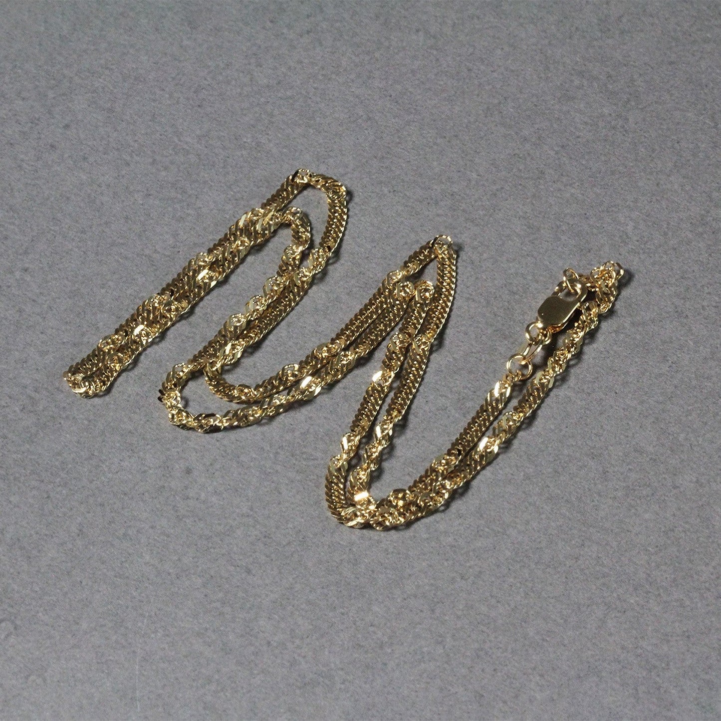 Cadena Singapur de oro amarillo de 14k y 2.1mm