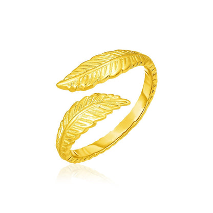Anillo de pie de oro amarillo de 14k estilo bypass con hojas