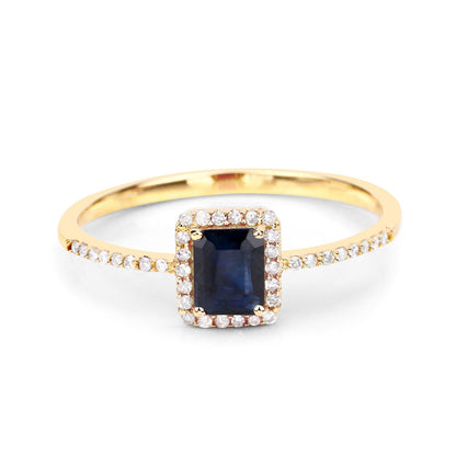 Anillo de oro amarillo de 14K con zafiro azul genuino de 0.60 quilates y diamantes blancos