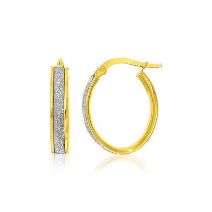 Pendientes de aro ovalados de oro de 14k de dos tonos con centro brillante