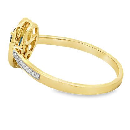 Anillo de zafiro y diamante de 0,54 ct en oro amarillo de 10 kt