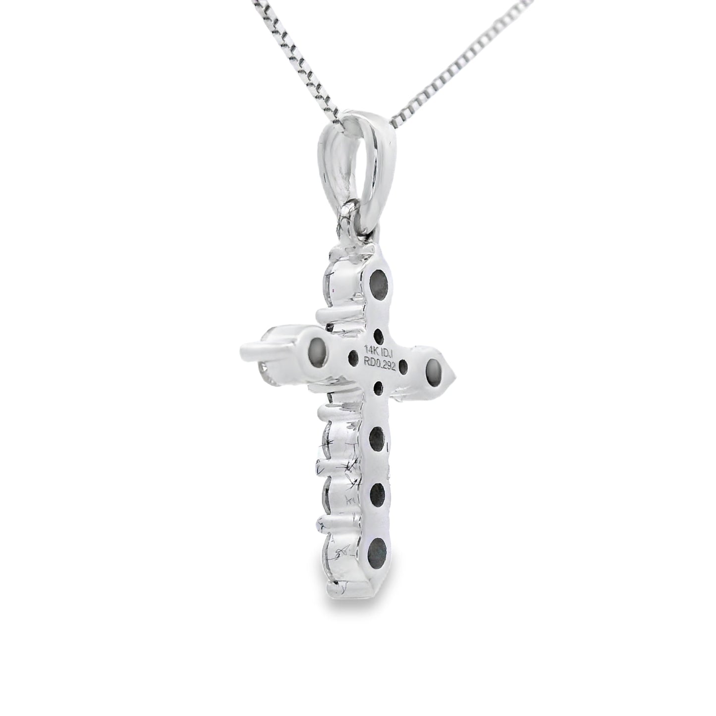 Colgante religioso de cruz con diamante de 0,30 qt en oro blanco de 14 kt