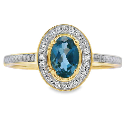 Anillo de topacio azul de Londres de 0,59 qt con diamantes en oro amarillo de 10 kt