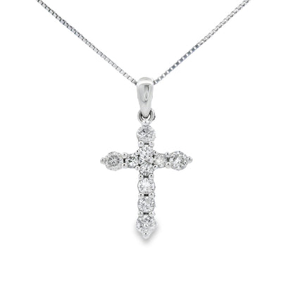 Colgante religioso de cruz con diamante de 0,30 qt en oro blanco de 14 kt