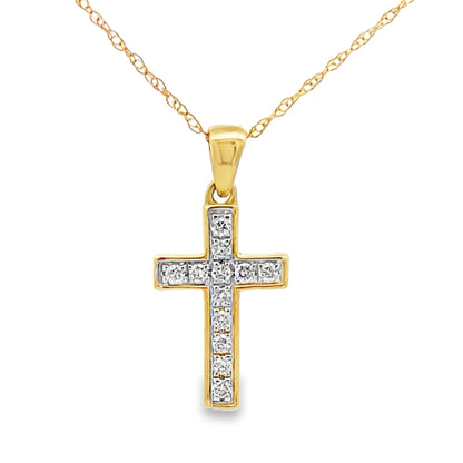 Colgante religioso de cruz con diamante de .12ct en oro amarillo de 14K