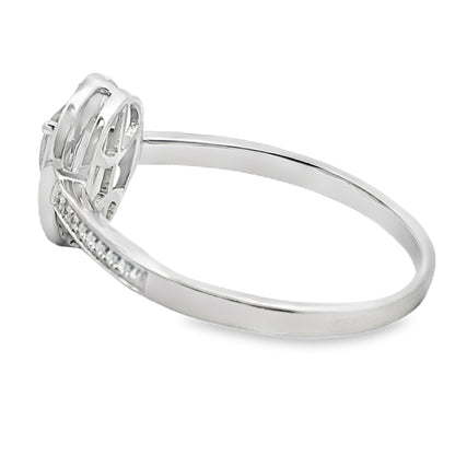 Anillo de oro blanco de 10 qt con topacio Mystic Fire de .50 ct y diamante