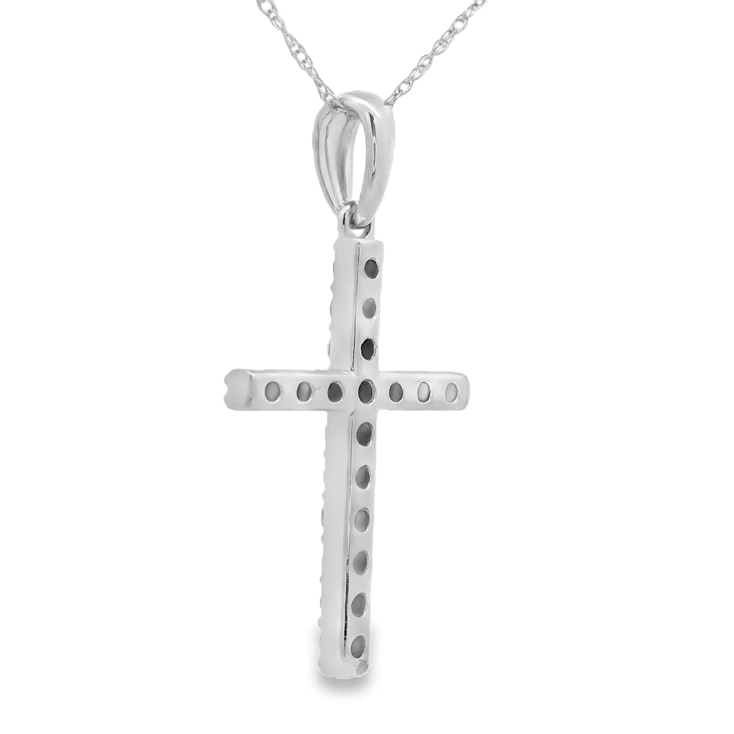 Colgante religioso de cruz con diamante de .45 ct en oro blanco de 14 kt