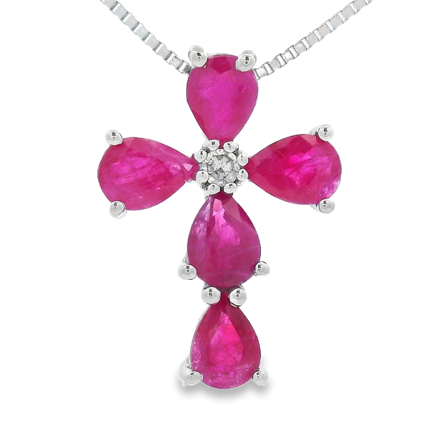 Colgante religioso de cruz con diamante rubí en oro blanco de 10 quilates