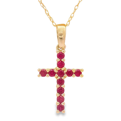 Colgante religioso de cruz con rubí de 0.29ct en oro amarillo de 14KT