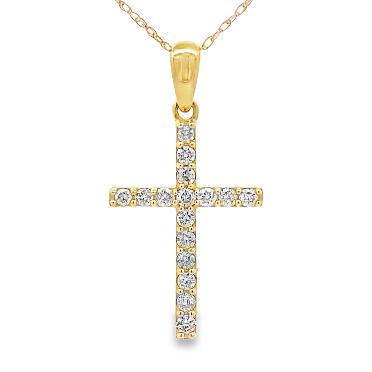 Colgante religioso de cruz con diamante de .30ct en oro amarillo de 14kt