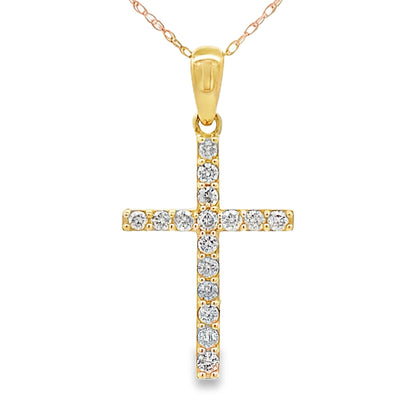 Colgante religioso de cruz con diamante de .30ct en oro amarillo de 14kt