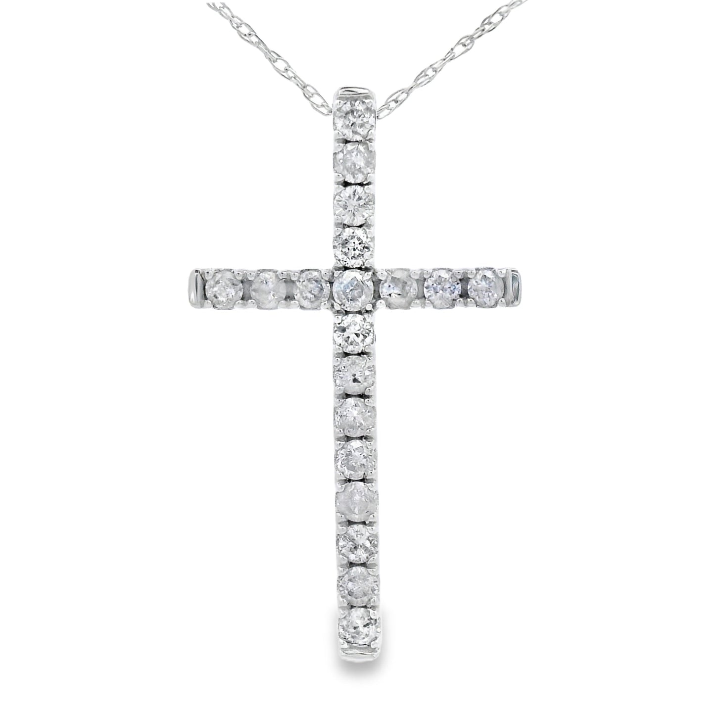 Colgante de cruz religiosa con diamante de .33 ct en oro blanco de 14 kt