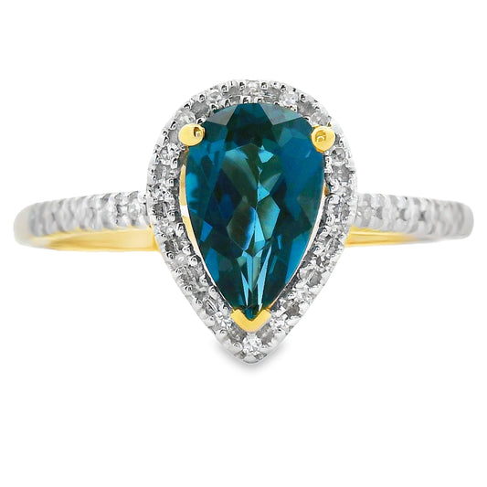 Anillo de topacio azul de Londres de 1,13 ct y diamantes en oro amarillo de 14 K.