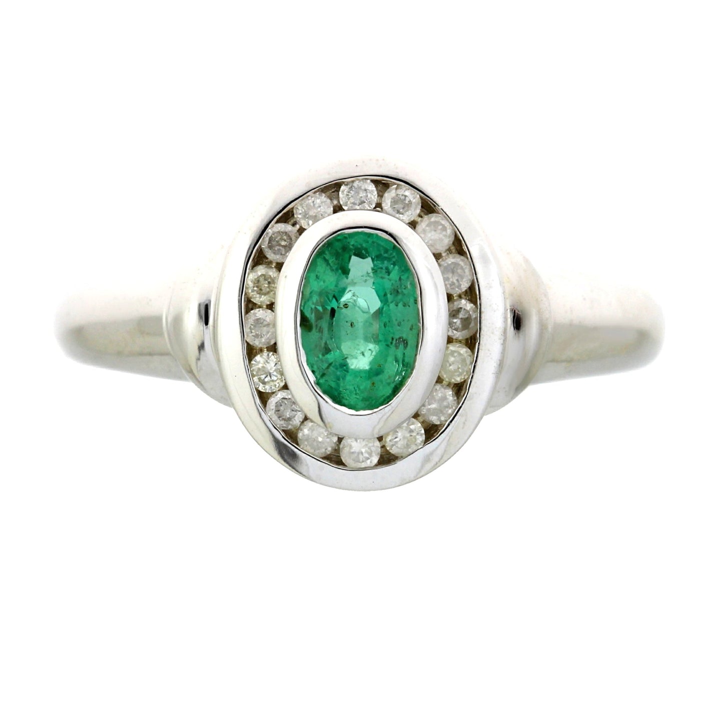 Anillo de oro blanco de 10 qt con esmeralda y diamantes de 0,60 ct